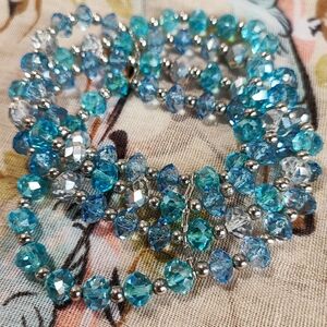 Azure Blue Faceted Glass Crystal Roll On 4 Strand Stretch Silver Tone Bracelet